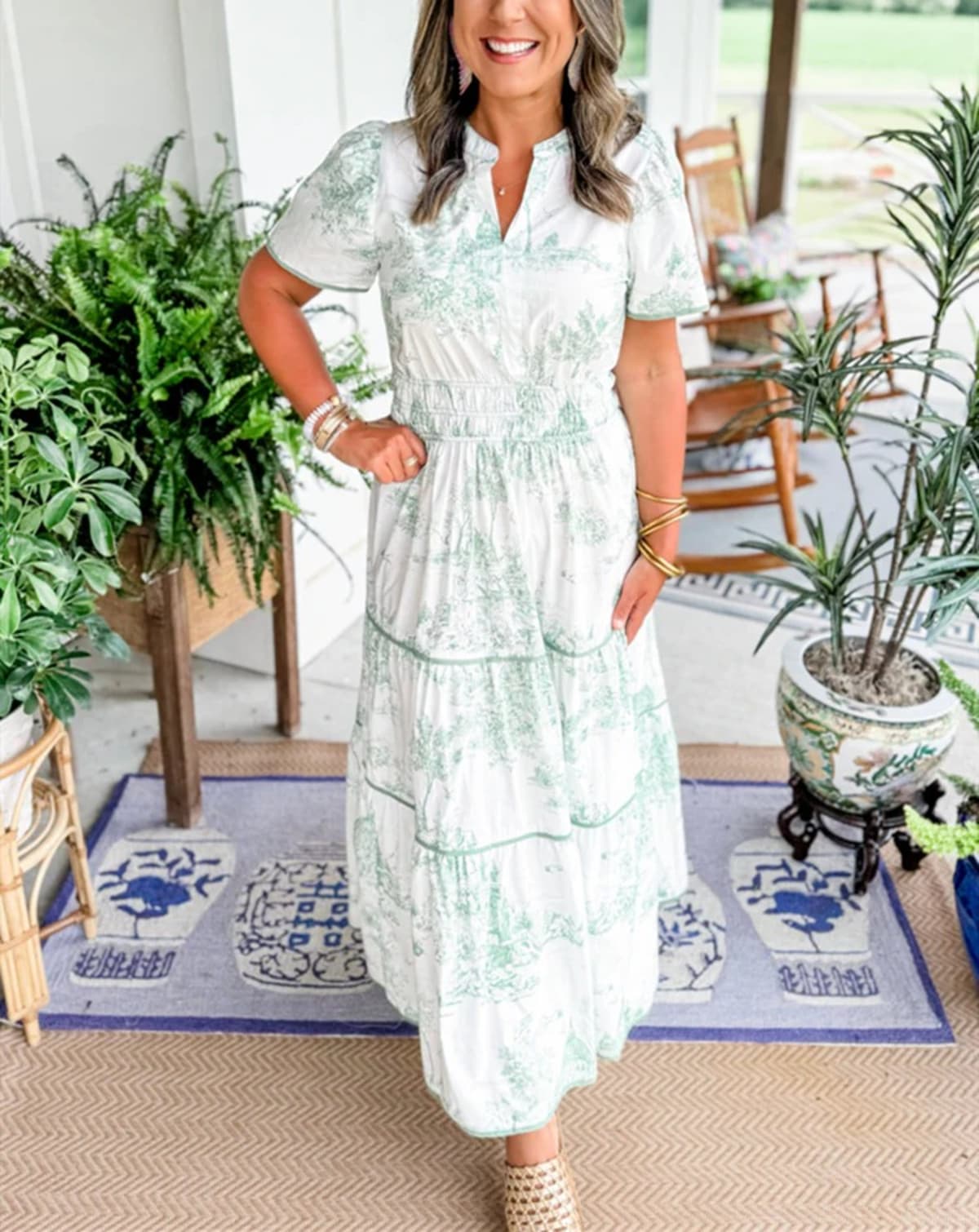 Maxi dress with smocked waist and tiered skirt.