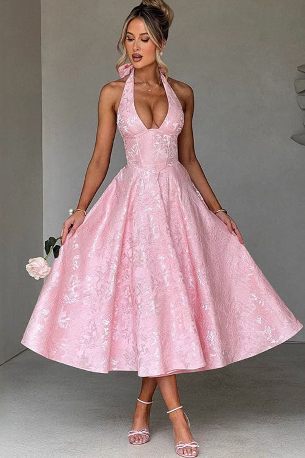 V-neck halterneck jacquard maxi dress with flared skirt.