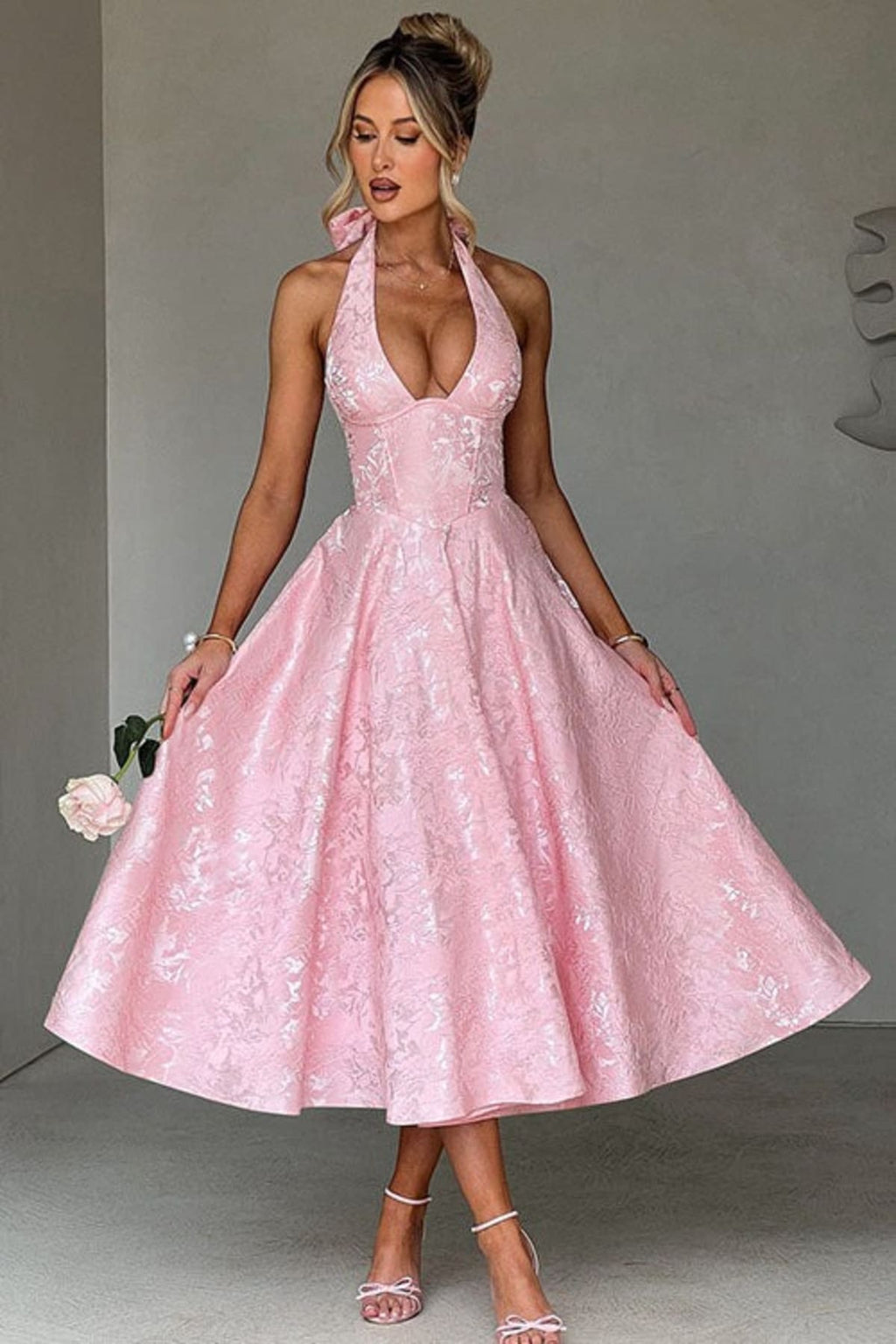 V-neck halterneck jacquard maxi dress with flared skirt.