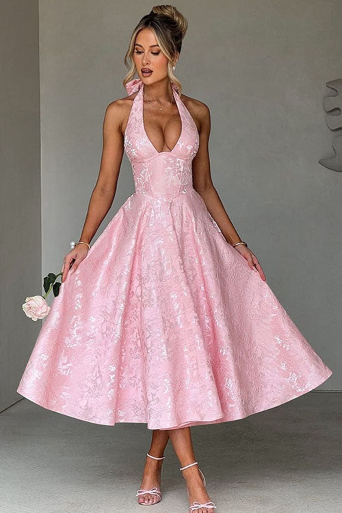V-neck halterneck jacquard maxi dress with flared skirt.