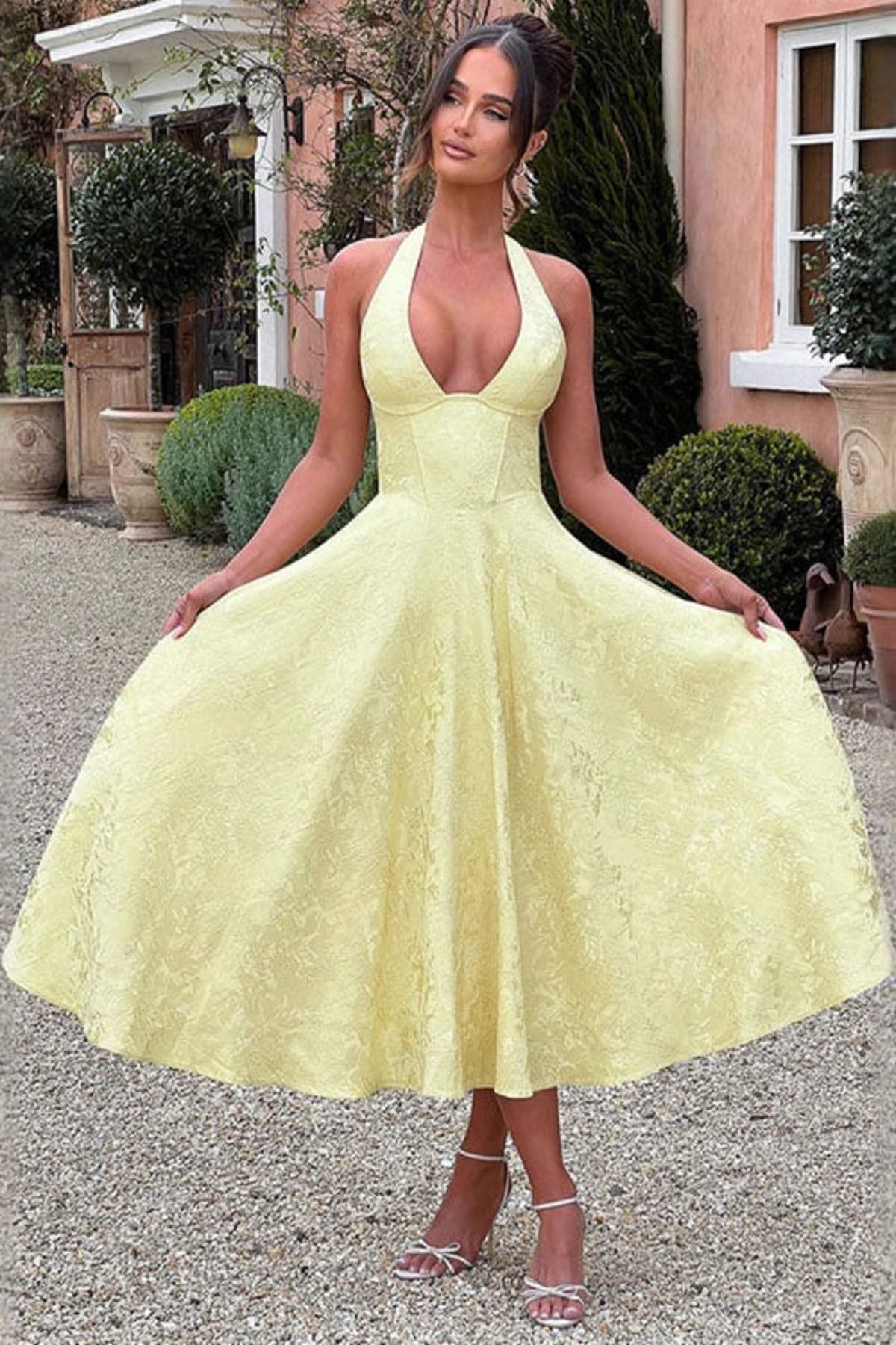V-neck halterneck jacquard maxi dress with flared skirt.