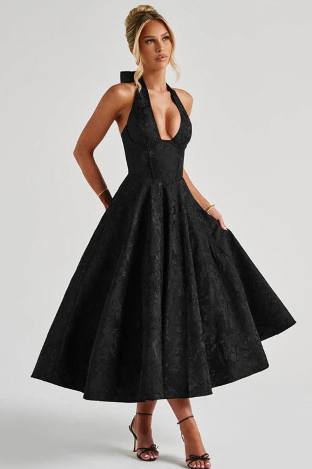 V-neck halterneck jacquard maxi dress with flared skirt.