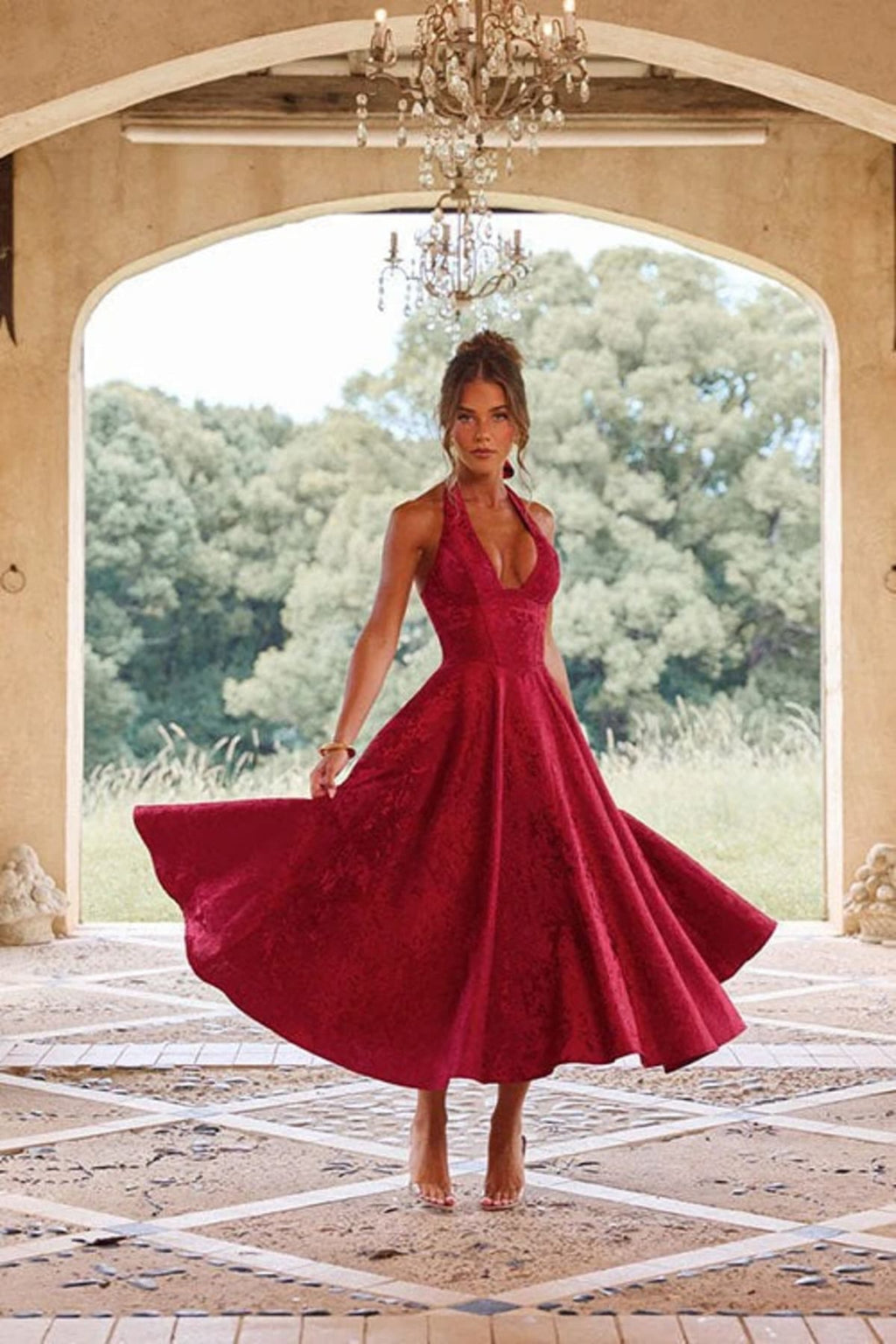 V-neck halterneck jacquard maxi dress with flared skirt.