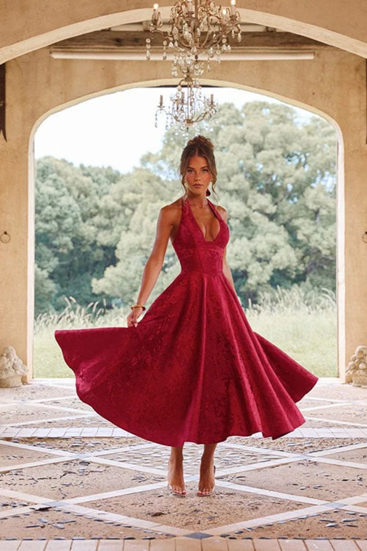 V-neck halterneck jacquard maxi dress with flared skirt.