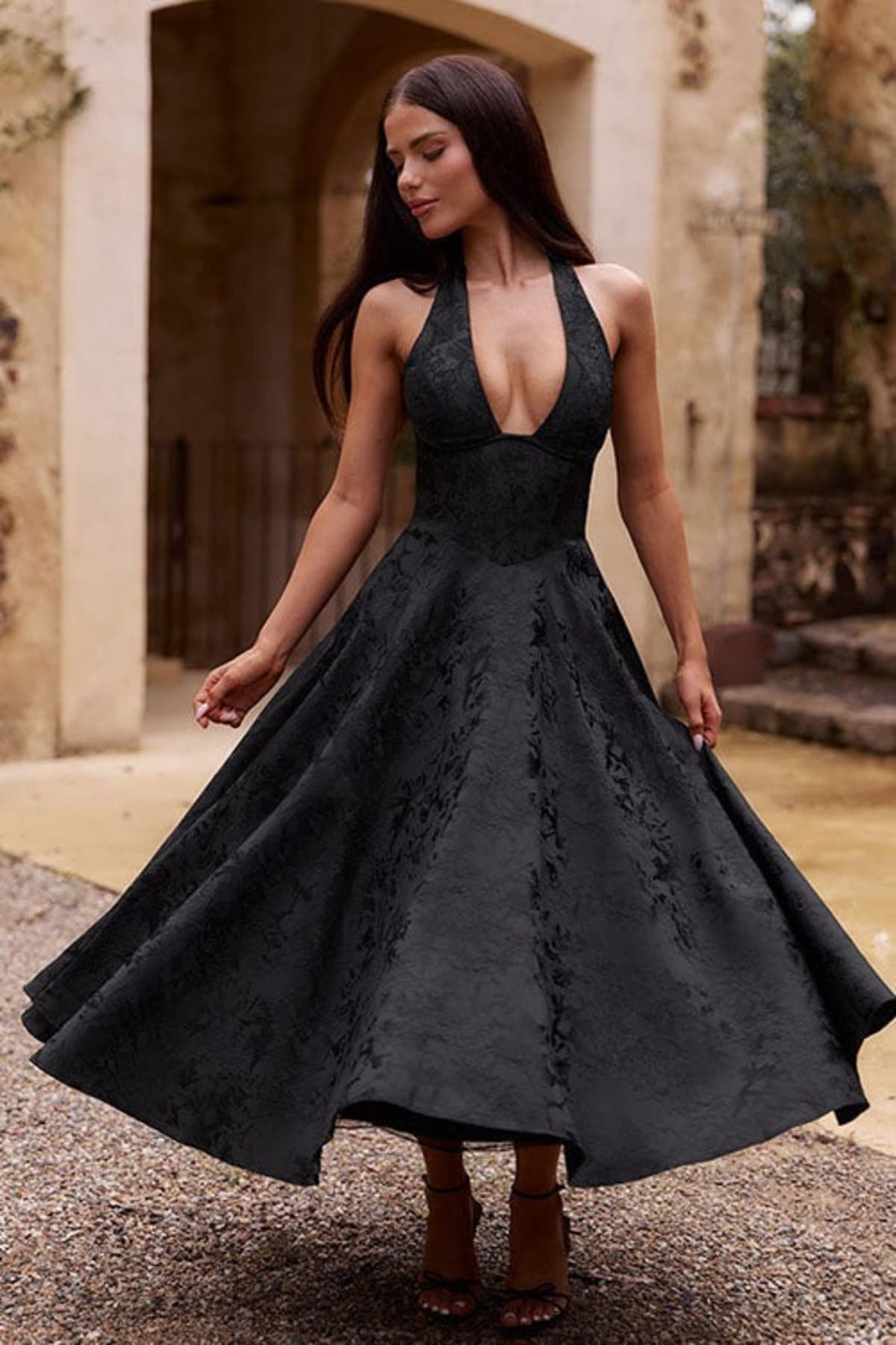 V-neck halterneck jacquard maxi dress with flared skirt.