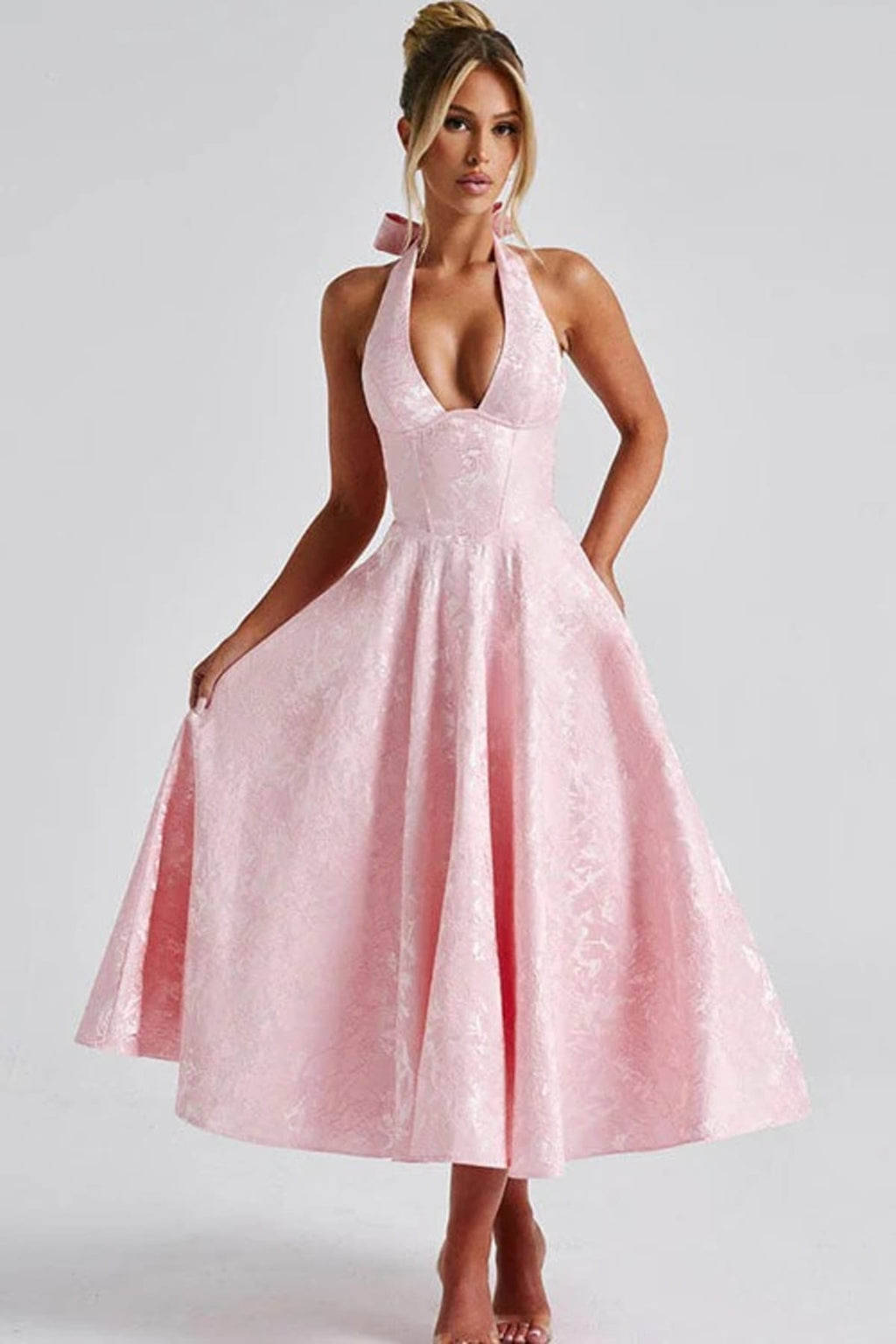 V-neck halterneck jacquard maxi dress with flared skirt.