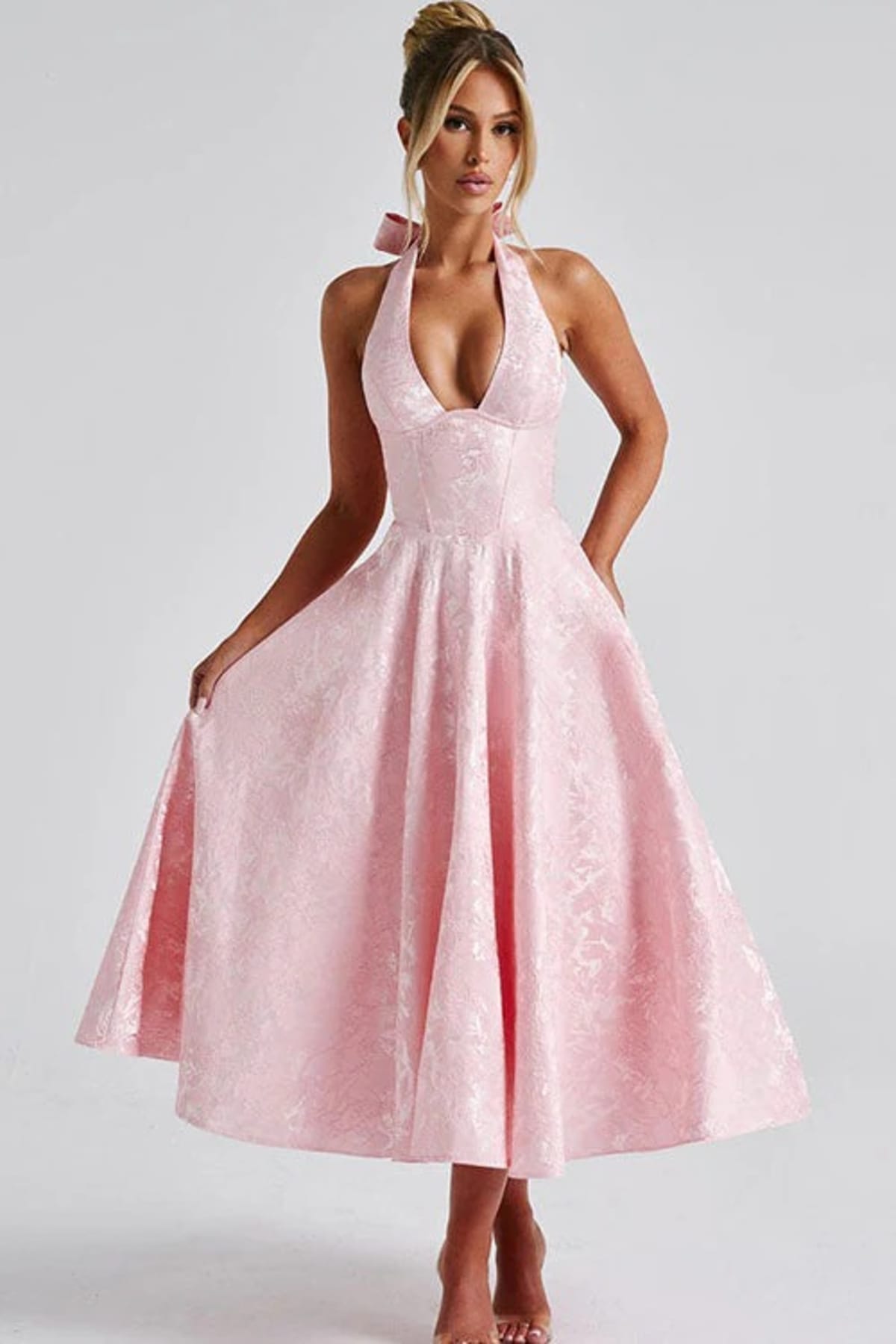 V-neck halterneck jacquard maxi dress with flared skirt.