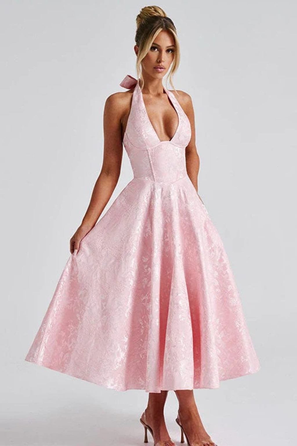 V-neck halterneck jacquard maxi dress with flared skirt.