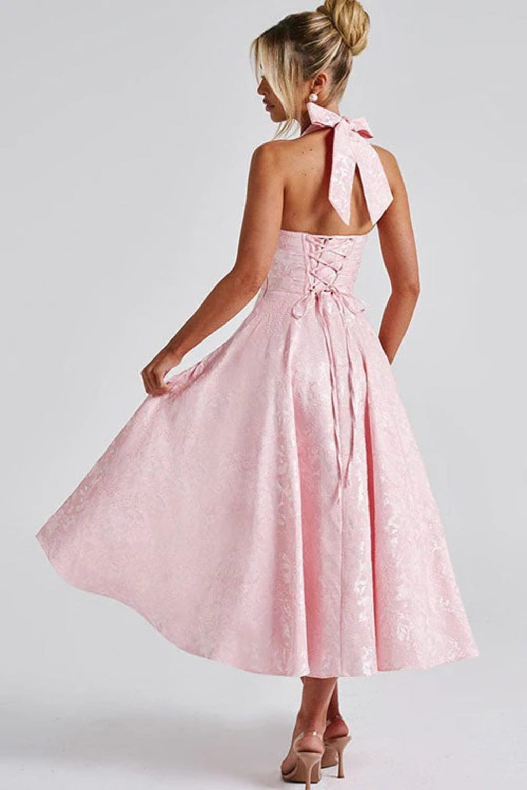 V-neck halterneck jacquard maxi dress with flared skirt.