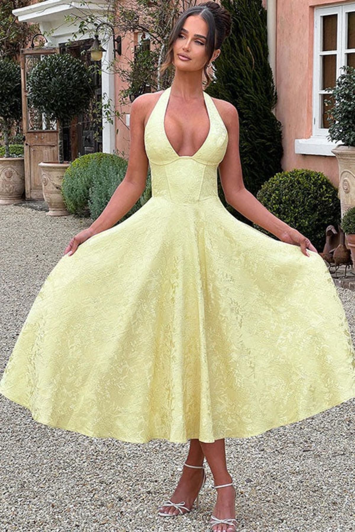 V-neck halterneck jacquard maxi dress with flared skirt.