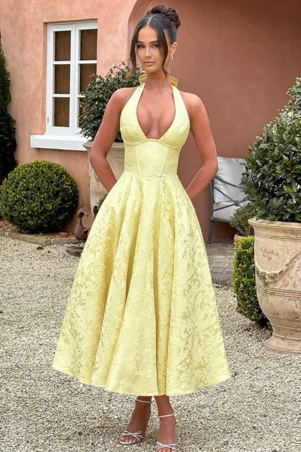V-neck halterneck jacquard maxi dress with flared skirt.