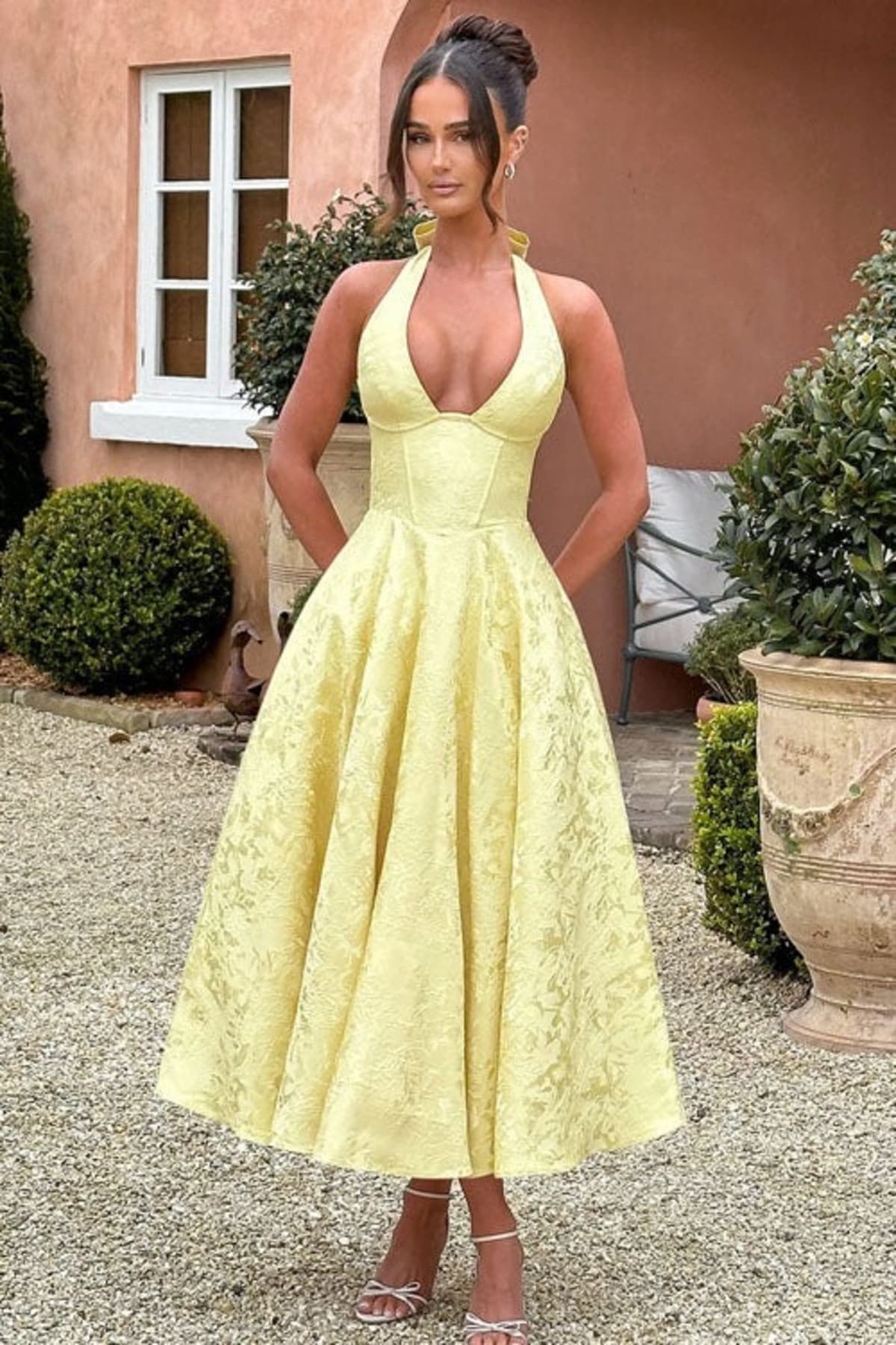 V-neck halterneck jacquard maxi dress with flared skirt.