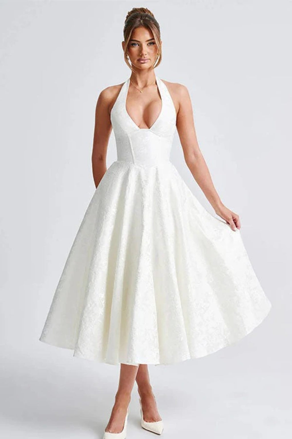 V-neck halterneck jacquard maxi dress with flared skirt.