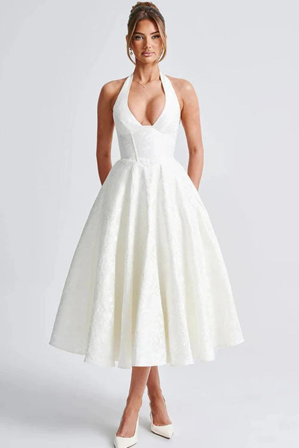 V-neck halterneck jacquard maxi dress with flared skirt.