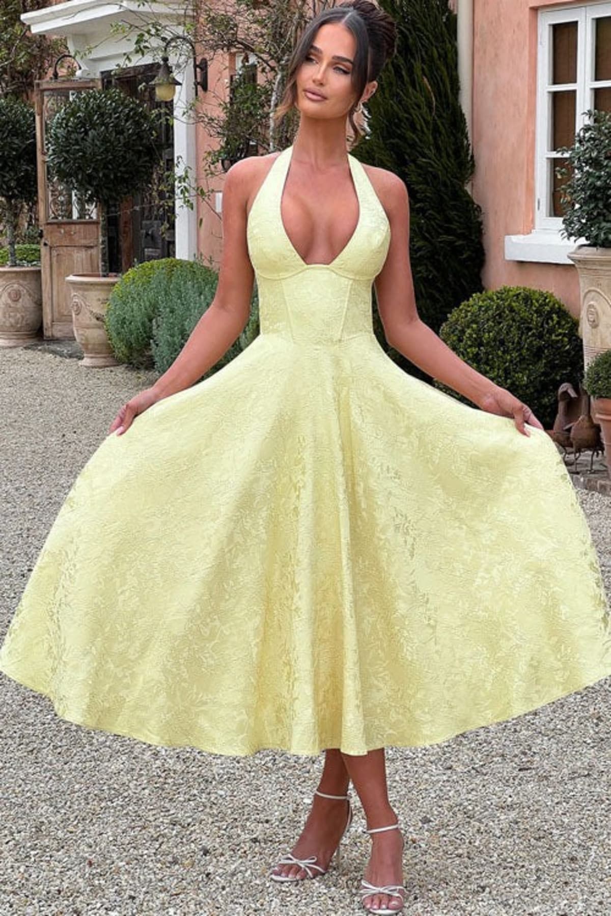 V-neck halterneck jacquard maxi dress with flared skirt.