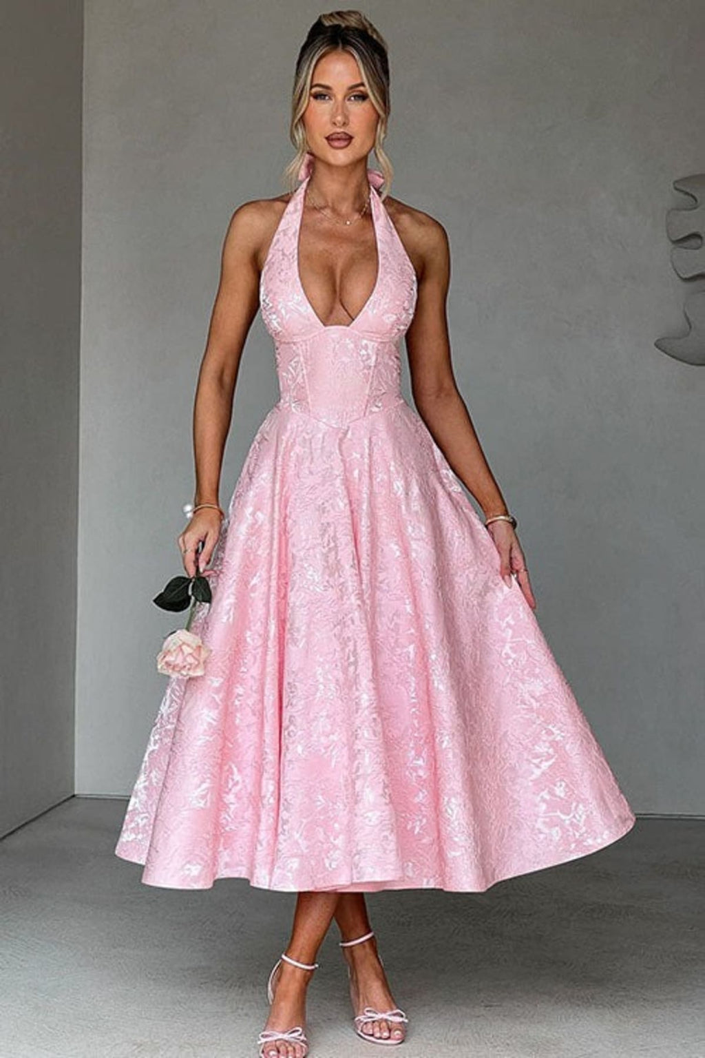 V-neck halterneck jacquard maxi dress with flared skirt.