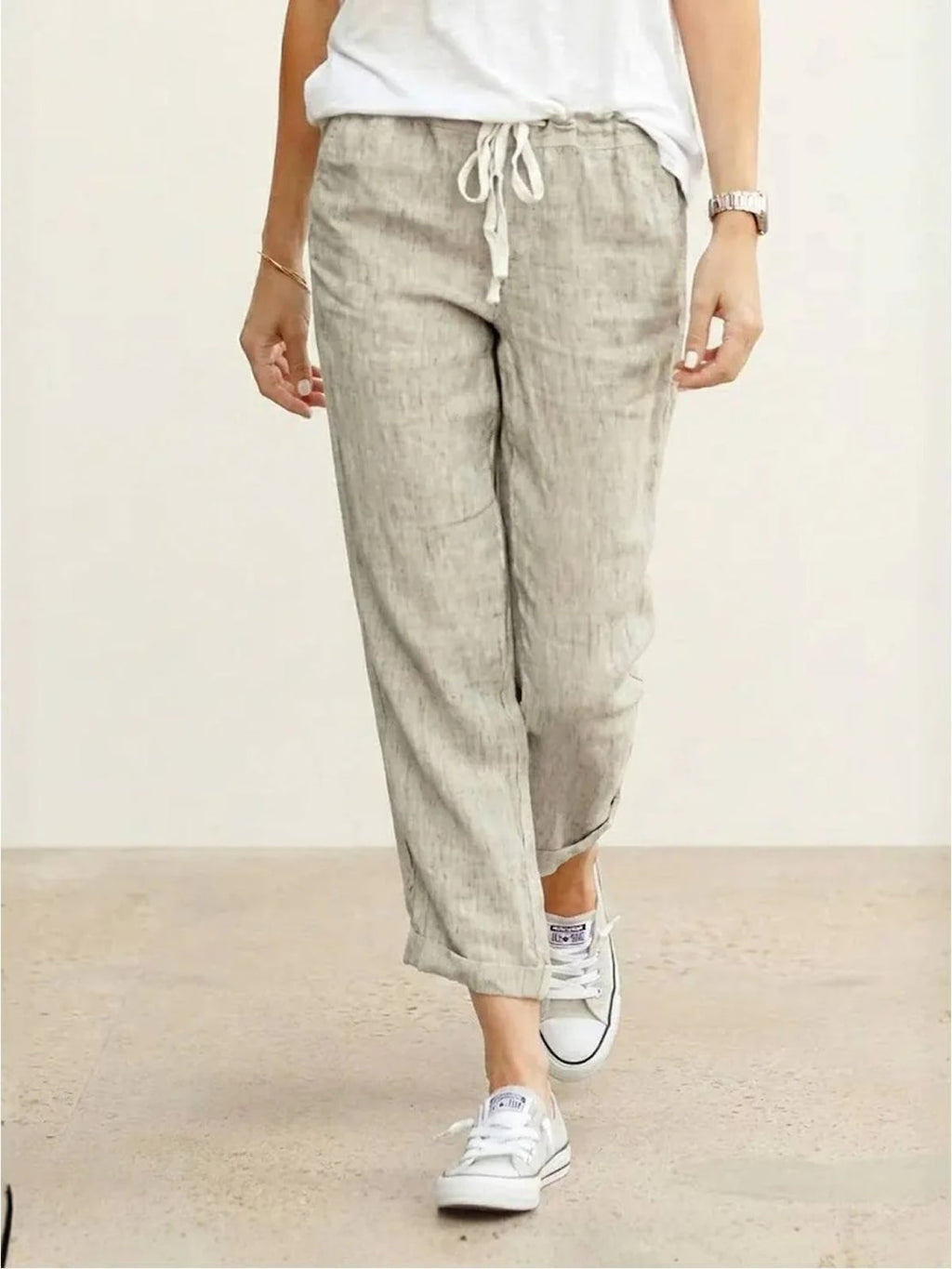 Women's straight-leg pants with drawstring and cuffed hem in a relaxed fit.