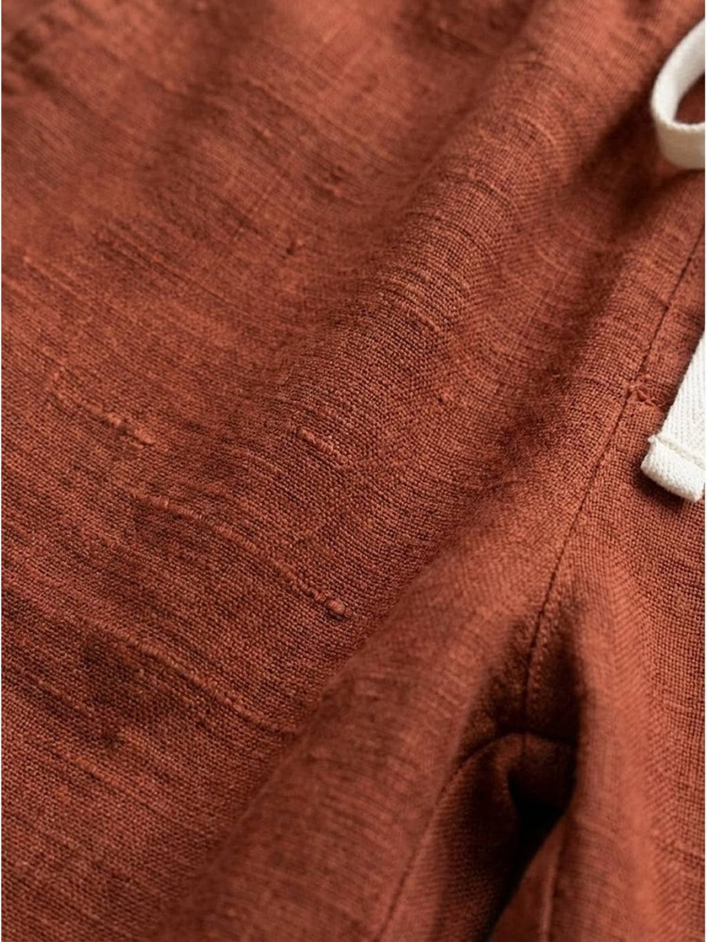 Women's straight-leg pants with drawstring and cuffed hem in a relaxed fit.