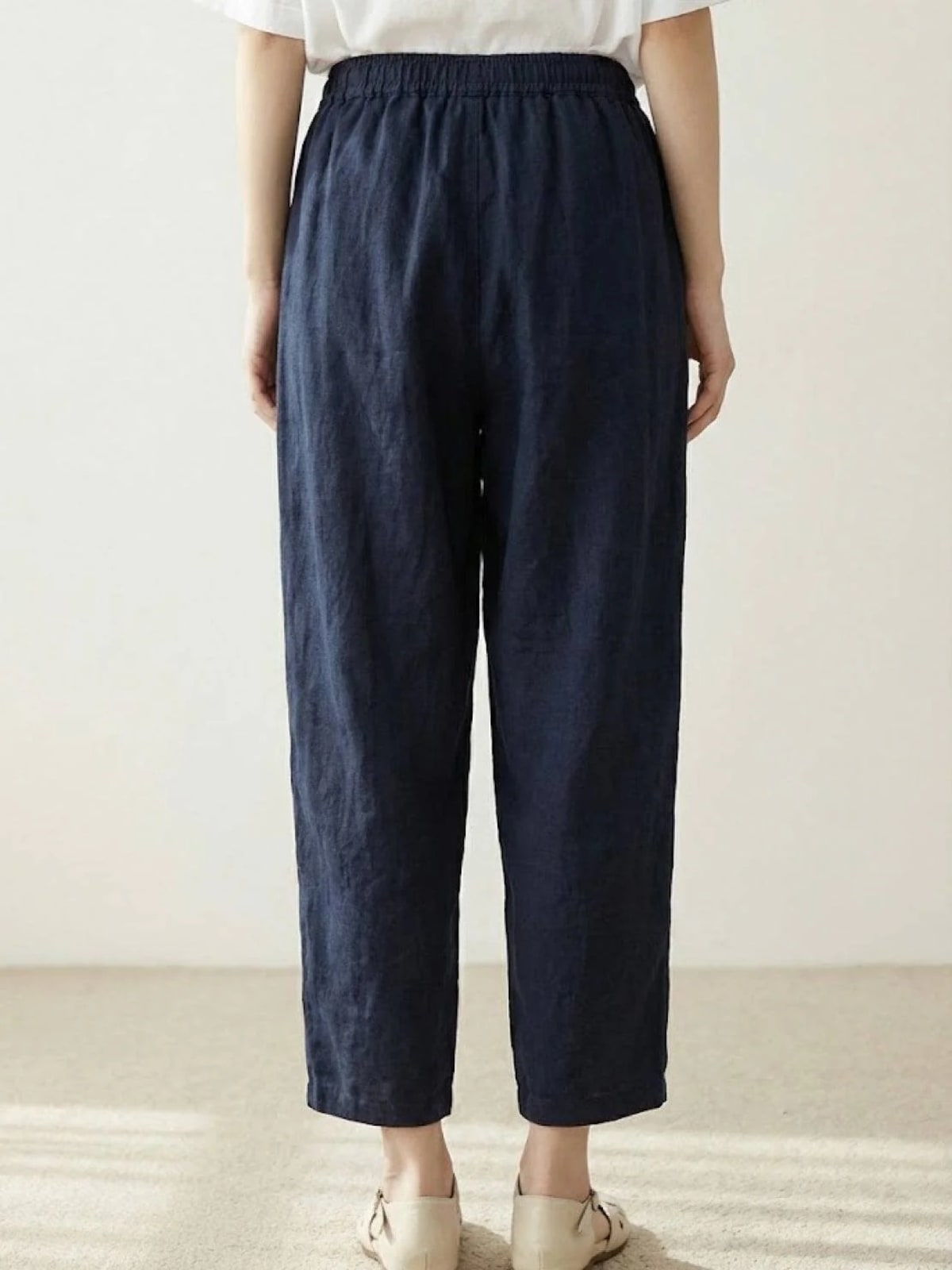Women's straight-leg pants with drawstring and cuffed hem in a relaxed fit.