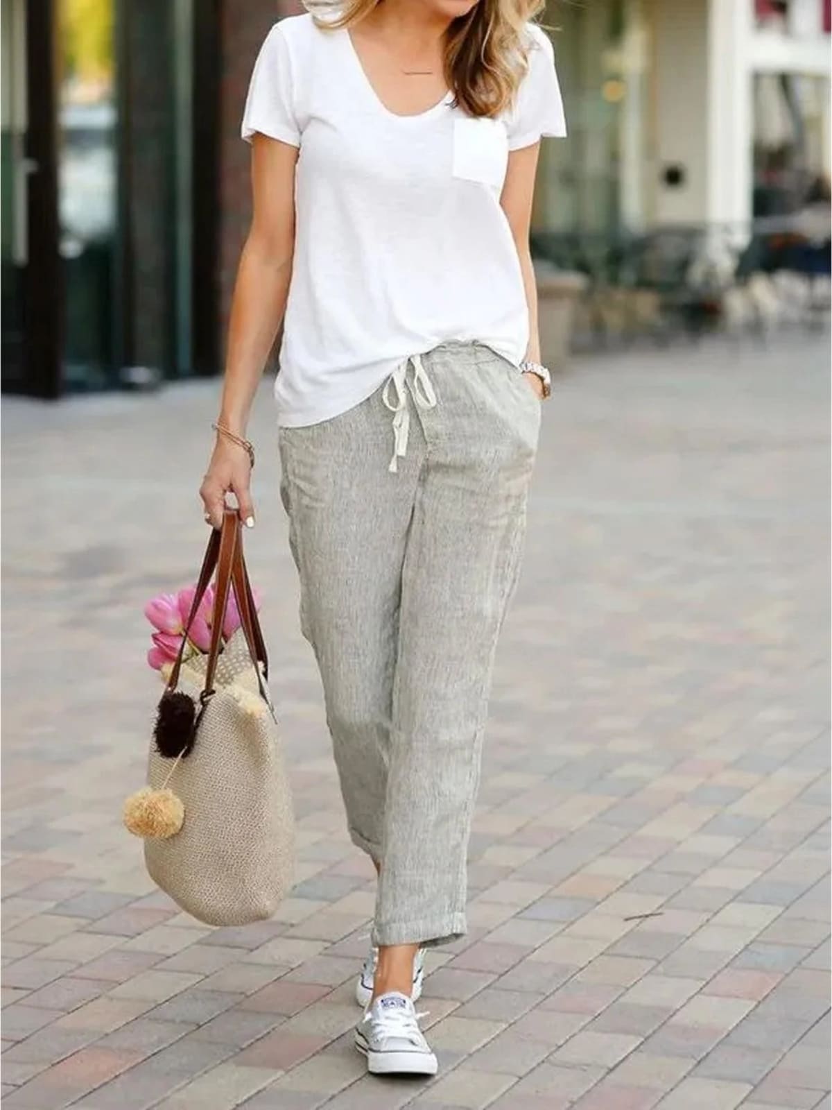Women's straight-leg pants with drawstring and cuffed hem in a relaxed fit.