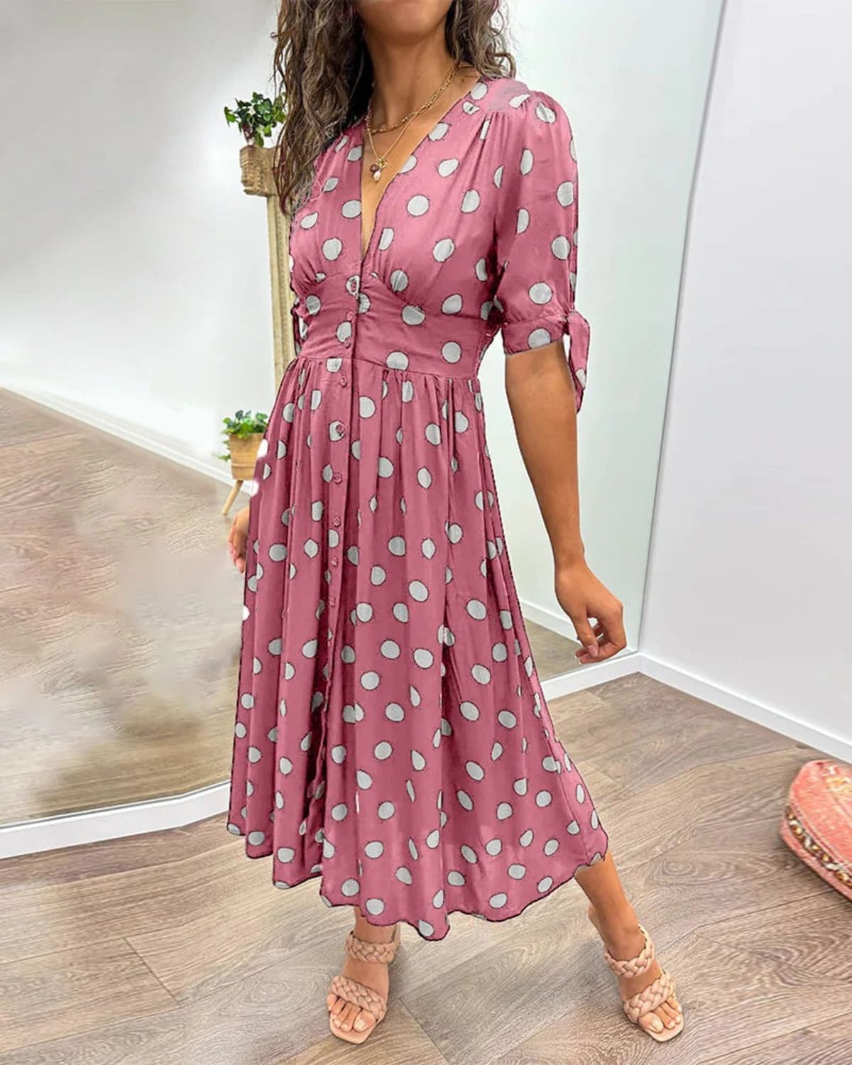 V-neck polka dot dress with button closure, garden party wear