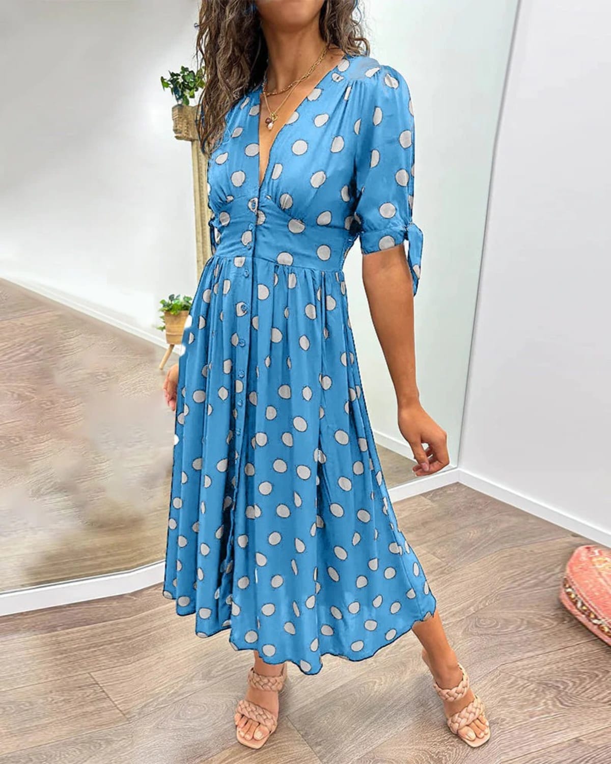 V-neck polka dot dress with button closure, garden party wear