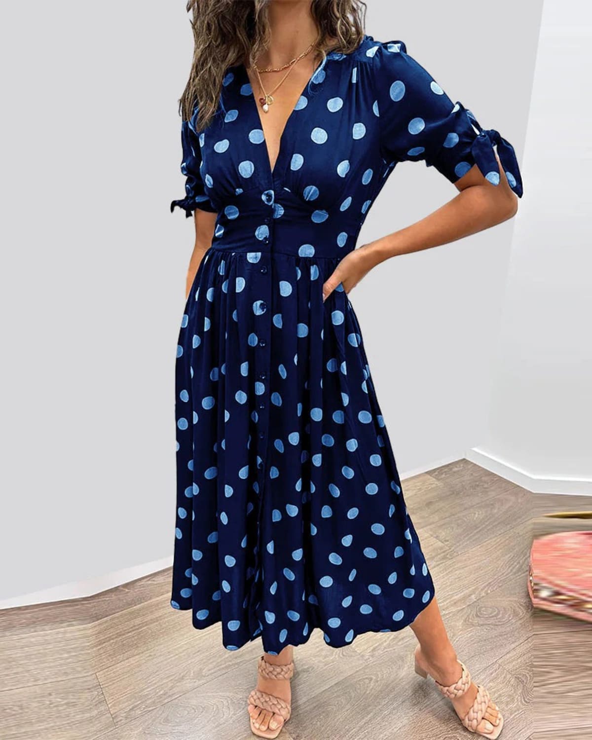 V-neck polka dot dress with button closure, garden party wear