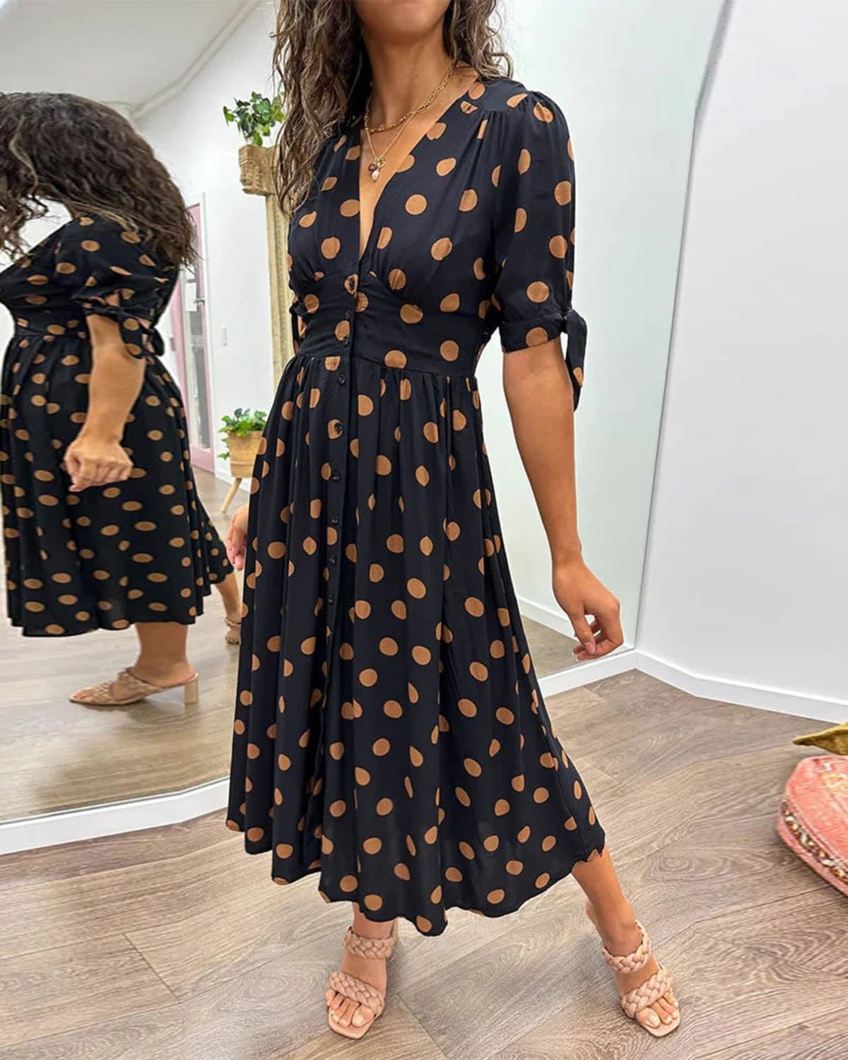 V-neck polka dot dress with button closure, garden party wear