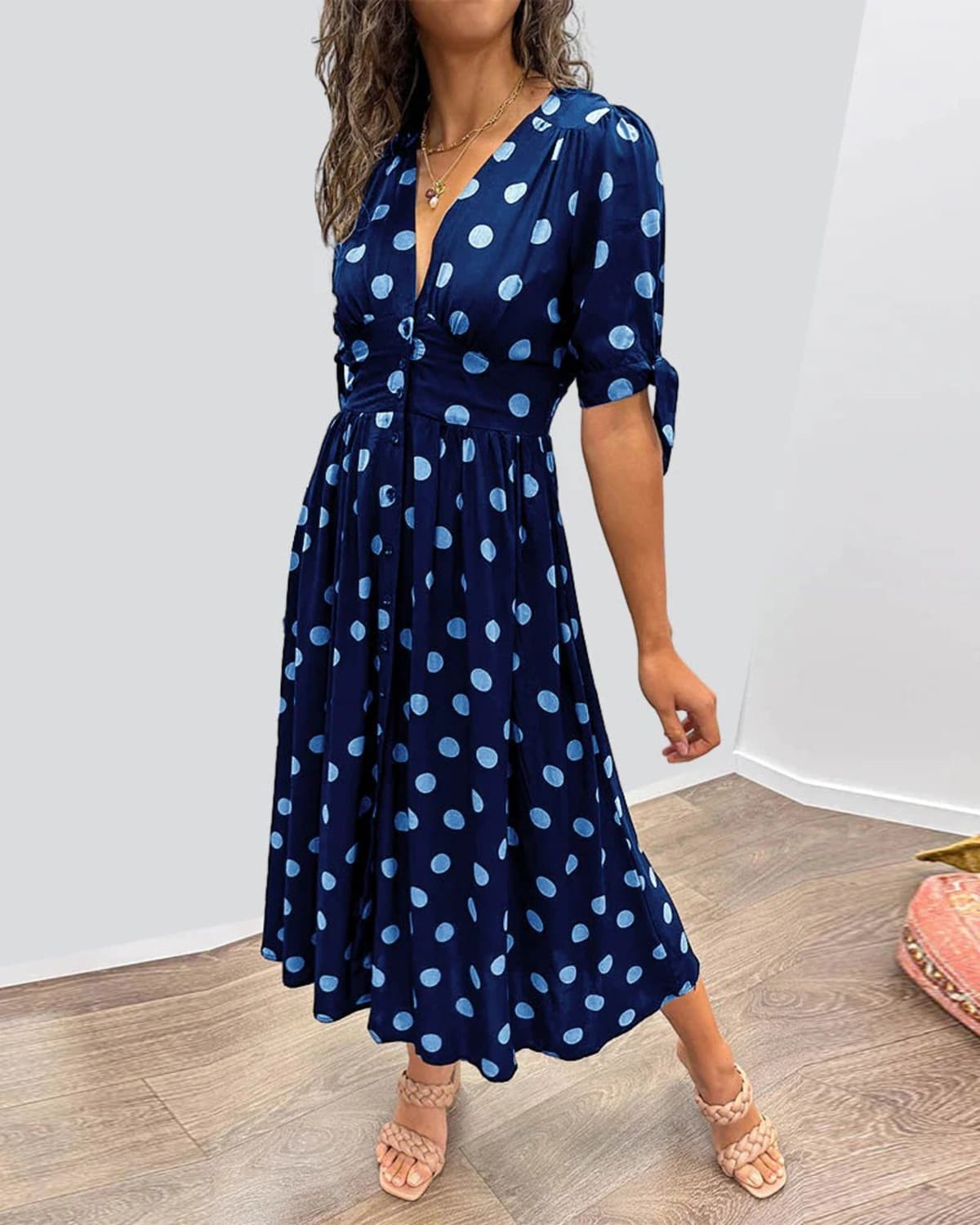 V-neck polka dot dress with button closure, garden party wear