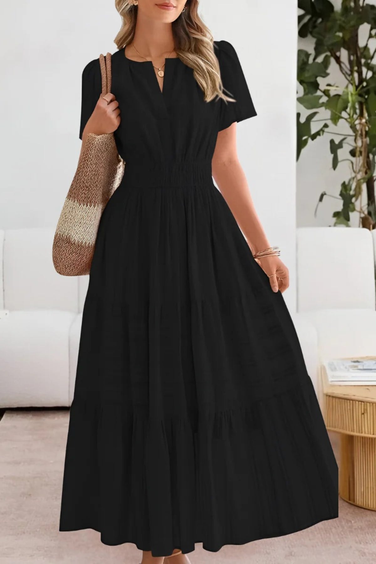 Flowing boho summer dress with delicate patterns and loose fit.