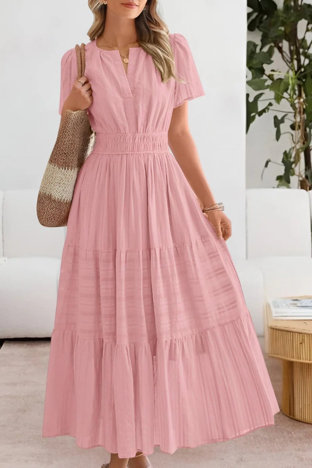 Flowing boho summer dress with delicate patterns and loose fit.