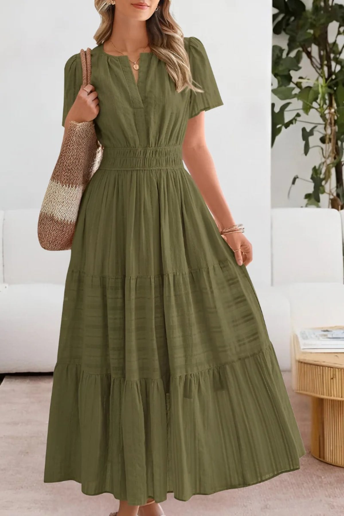 Flowing boho summer dress with delicate patterns and loose fit.