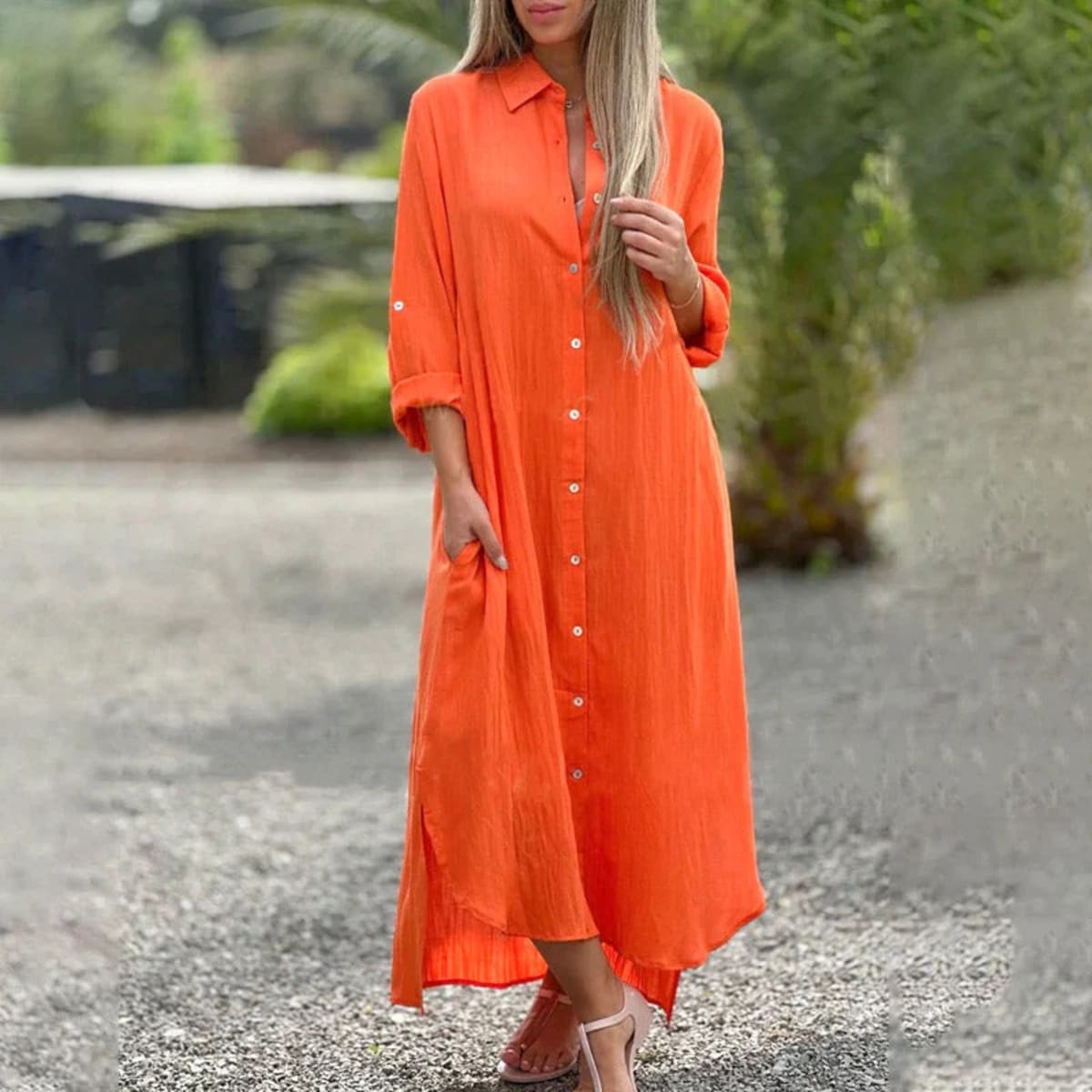 Women's maxi shirt dress with button-down front and collar.