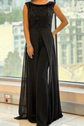 Crew-neck jumpsuit with textured panels and streamlined fit.
