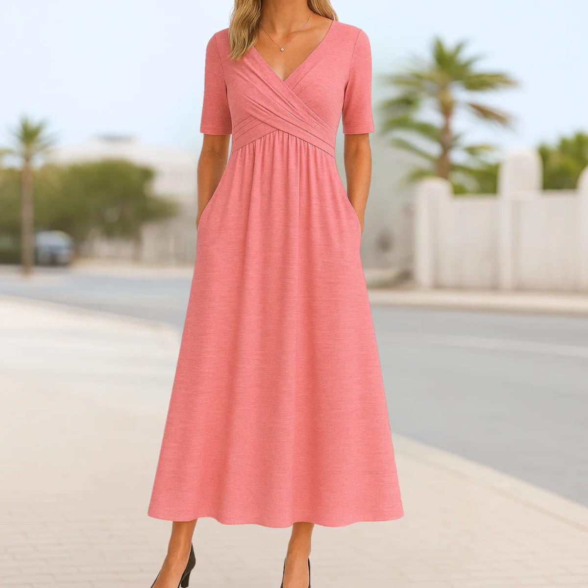 Short sleeve dress with crossed design and A-line fit.