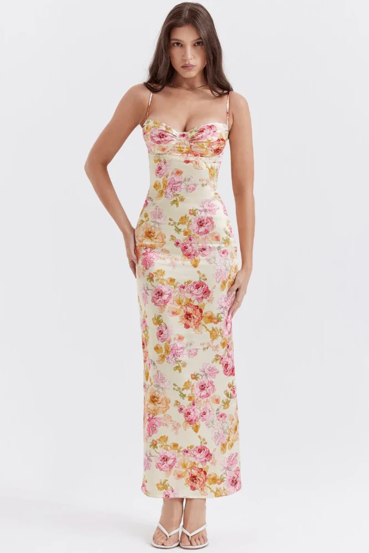 Floral spaghetti strap dress with flowing fit and lightweight fabric.