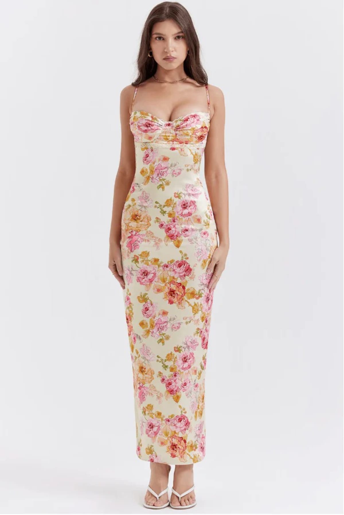 Floral spaghetti strap dress with flowing fit and lightweight fabric.