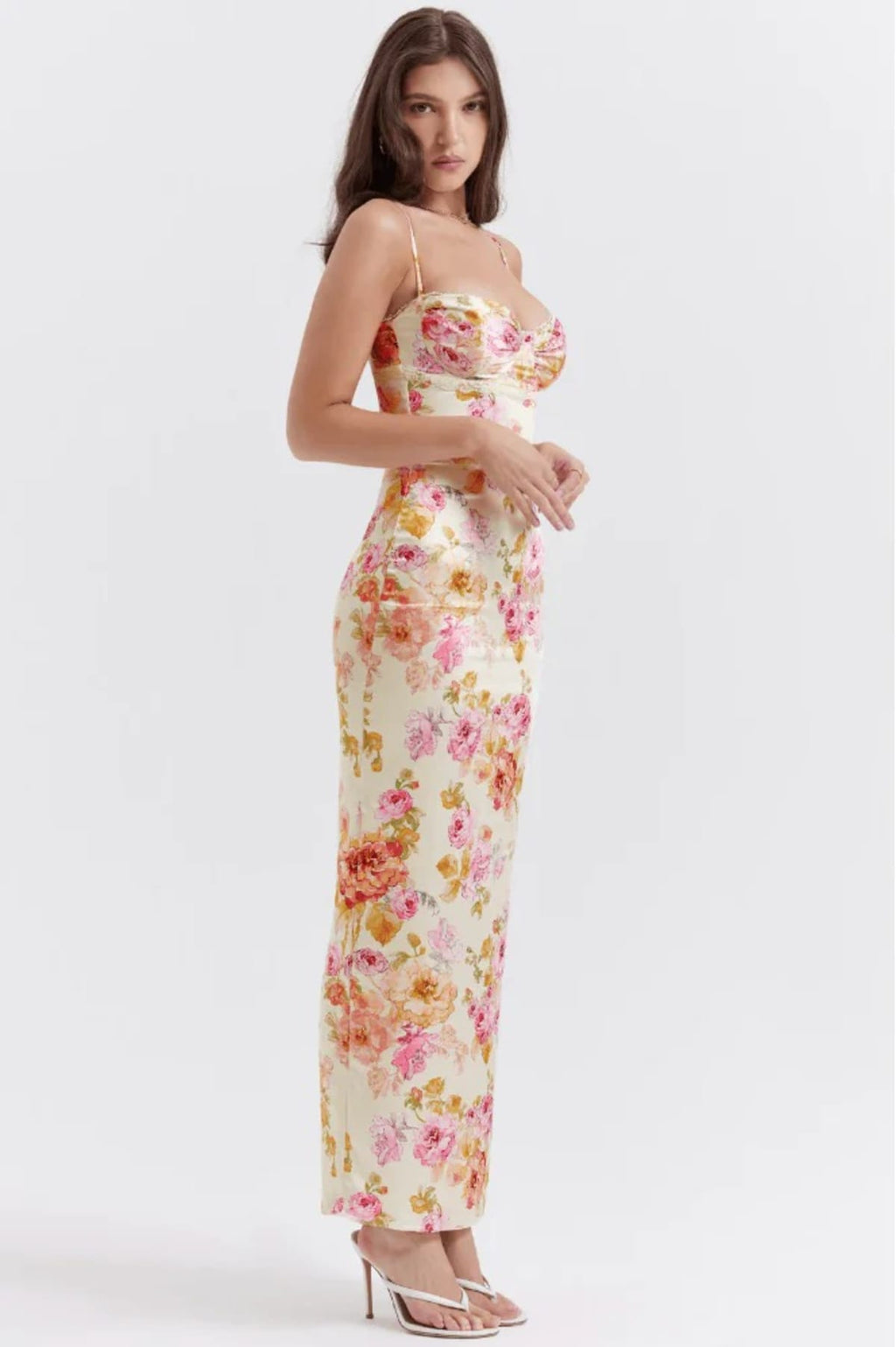 Floral spaghetti strap dress with flowing fit and lightweight fabric.