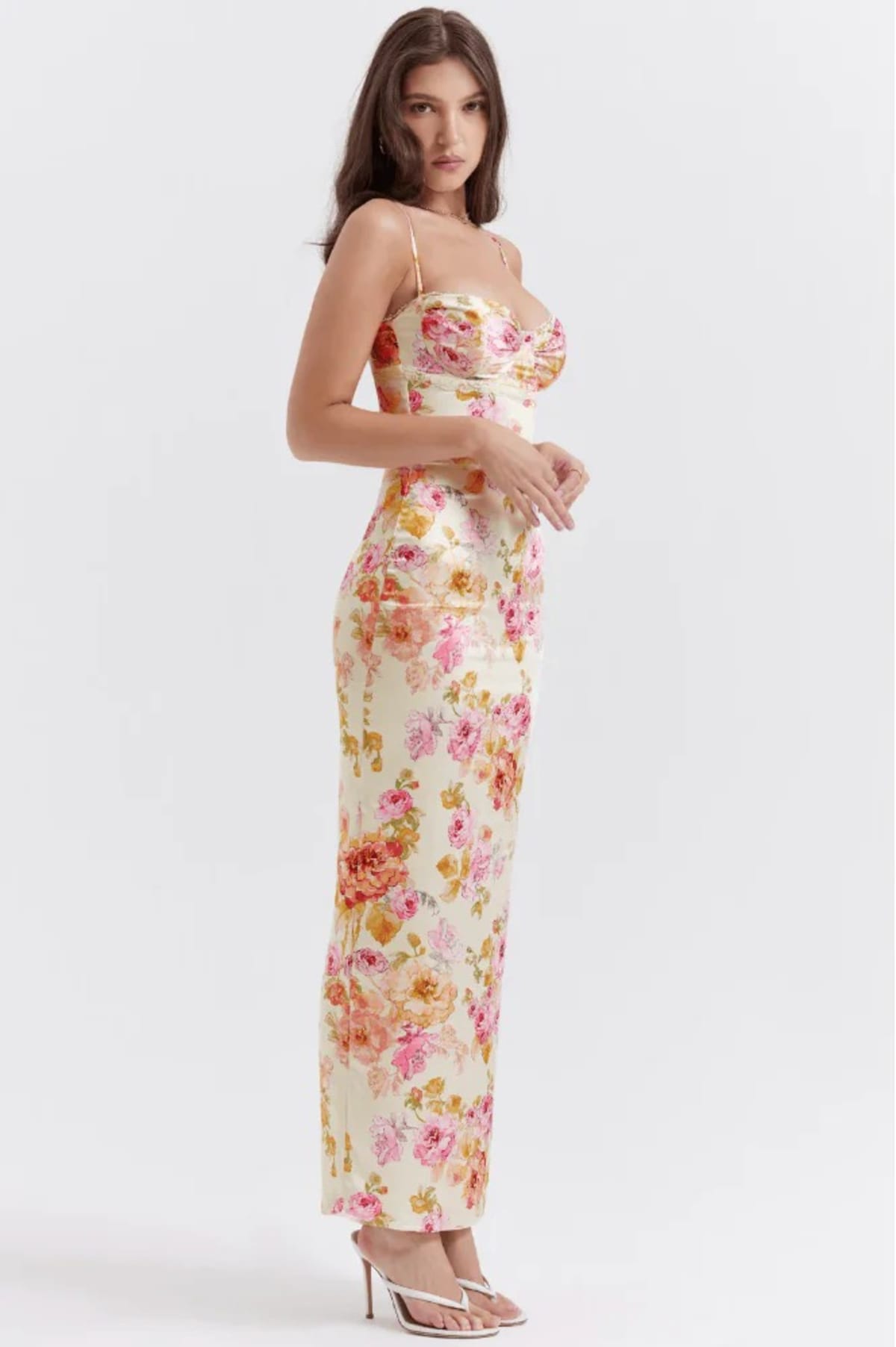 Floral spaghetti strap dress with flowing fit and lightweight fabric.
