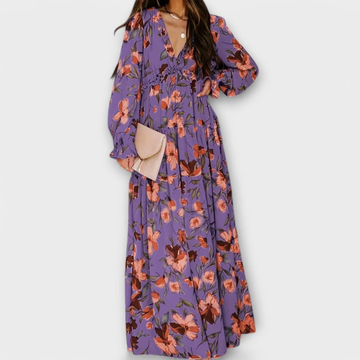 Floral V-neck maxi dress with flowing silhouette and lightweight fabric.