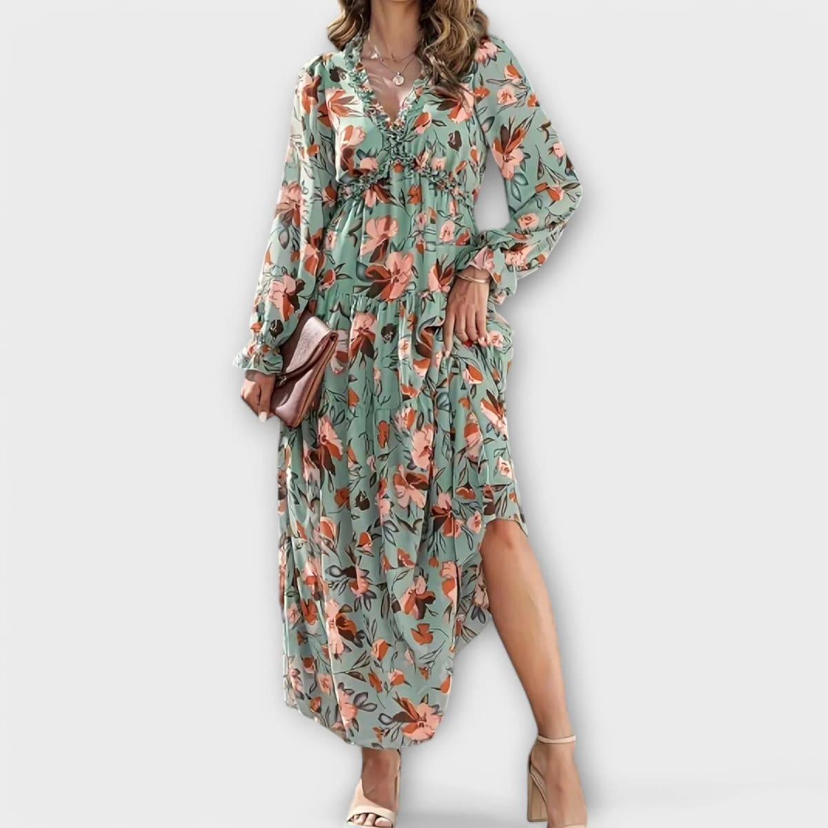 Floral V-neck maxi dress with flowing silhouette and lightweight fabric.