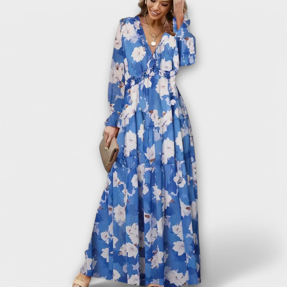 Floral V-neck maxi dress with flowing silhouette and lightweight fabric.