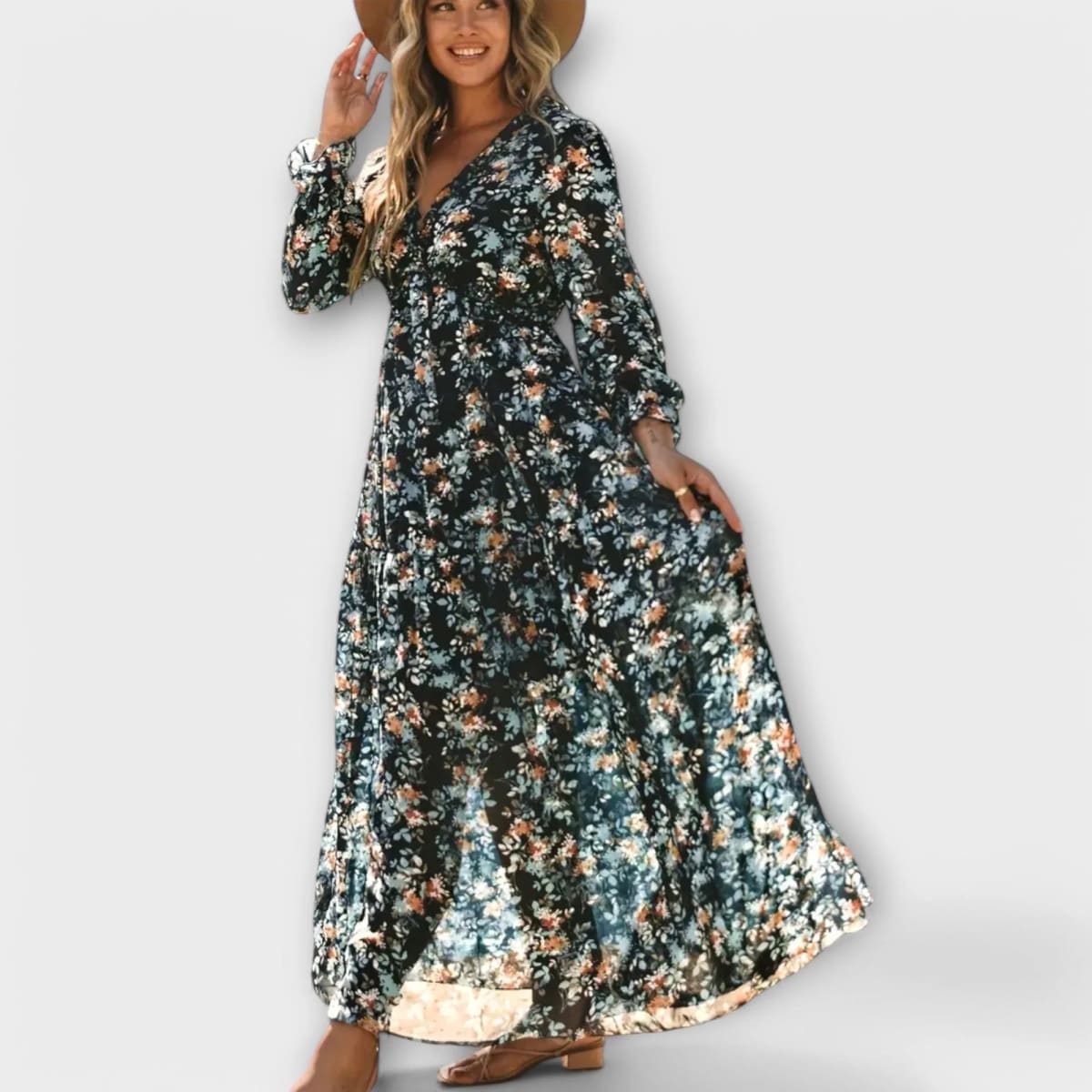 Floral V-neck maxi dress with flowing silhouette and lightweight fabric.