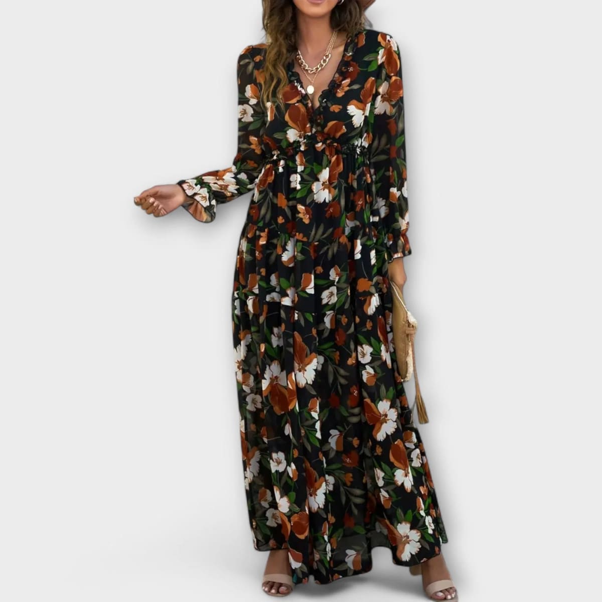 Floral V-neck maxi dress with flowing silhouette and lightweight fabric.