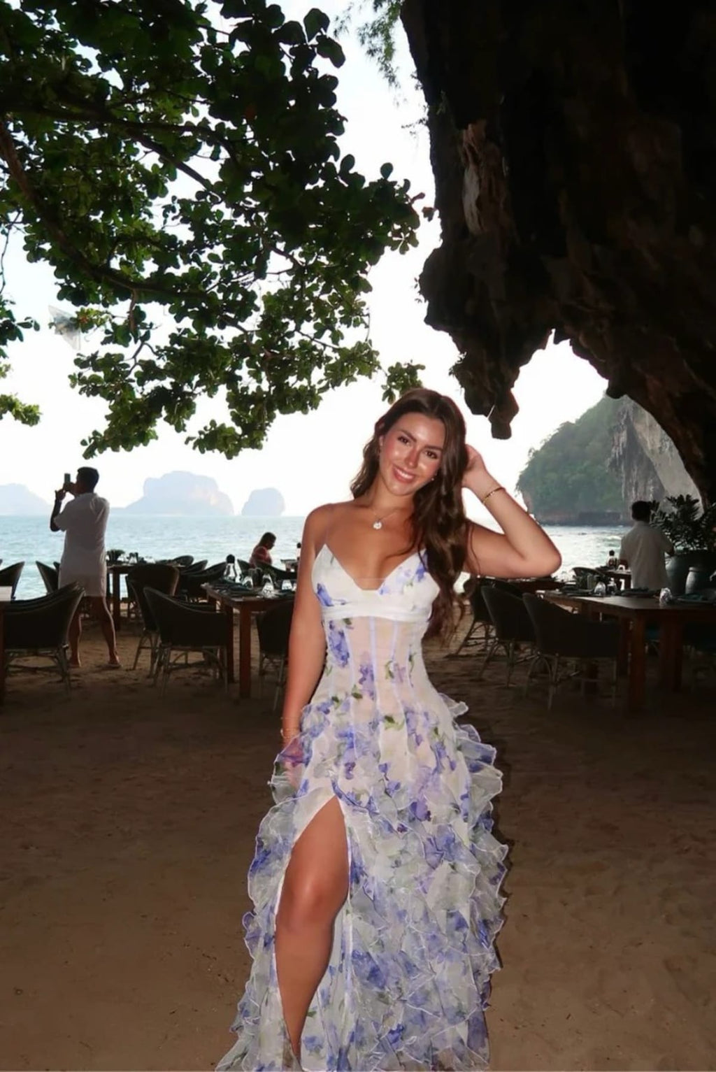 Lace floral maxi dress with cut-out details and split skirt.