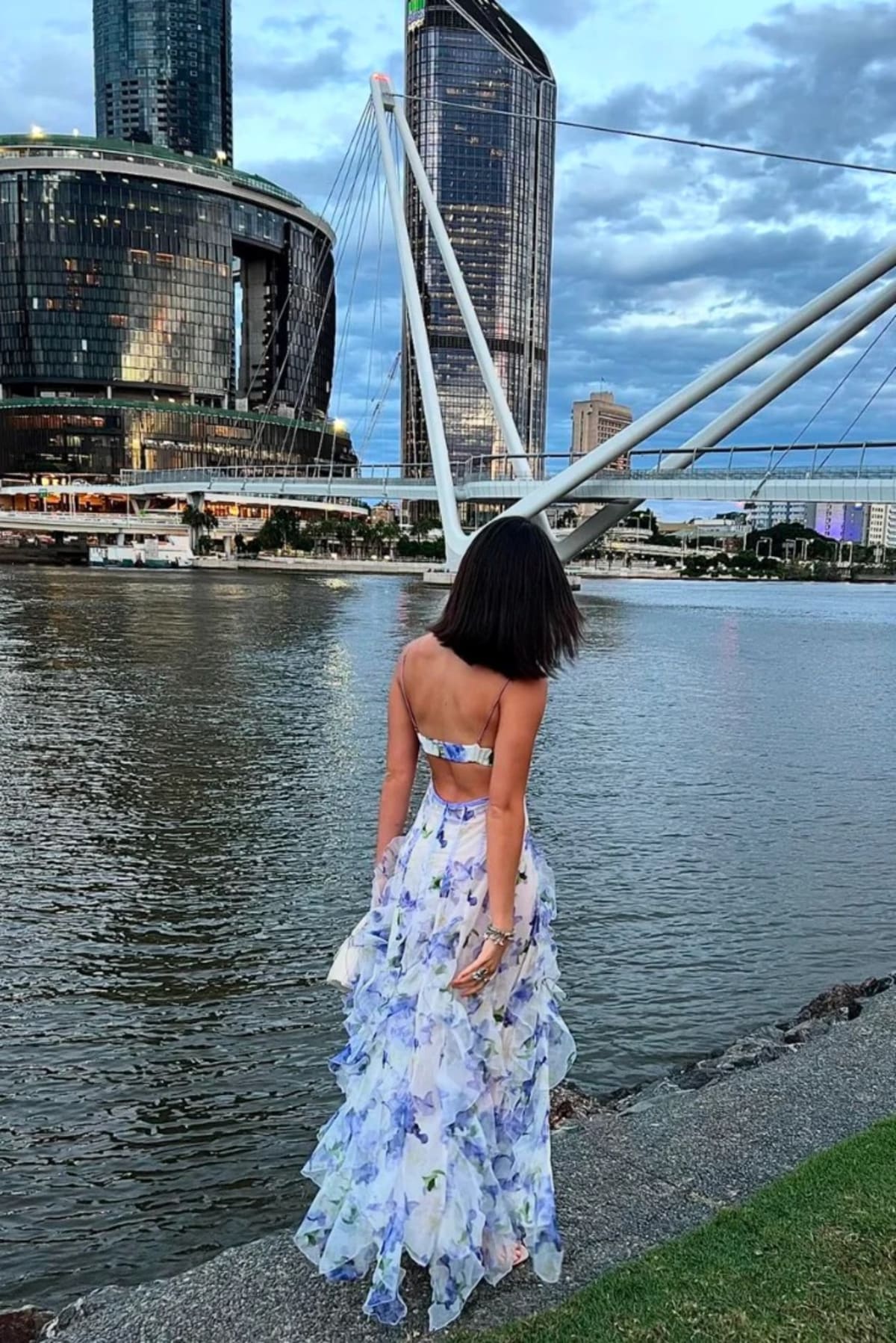 Lace floral maxi dress with cut-out details and split skirt.
