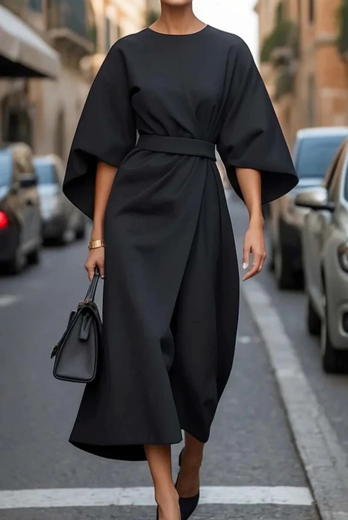 Elegant dress with lantern sleeves and adjustable waist bow.
