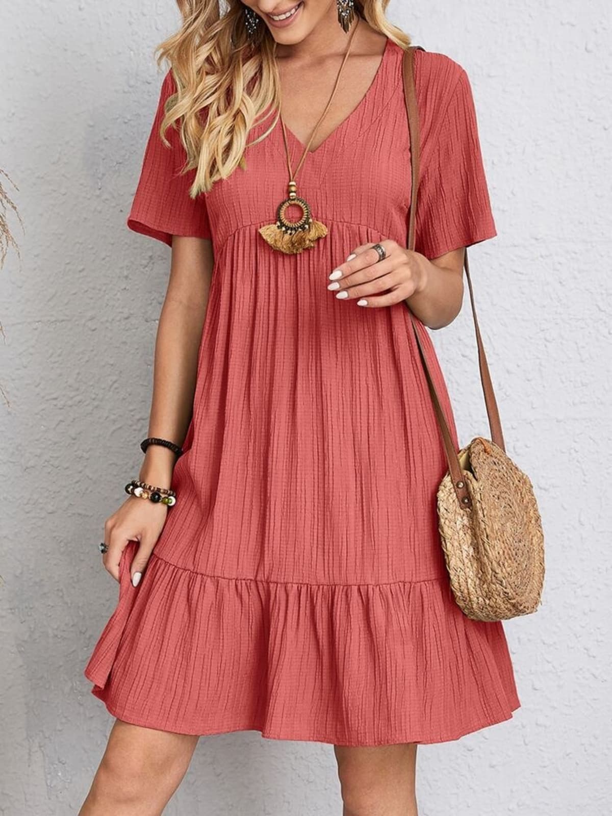 Layered dress with belly coverage, flattering silhouette.