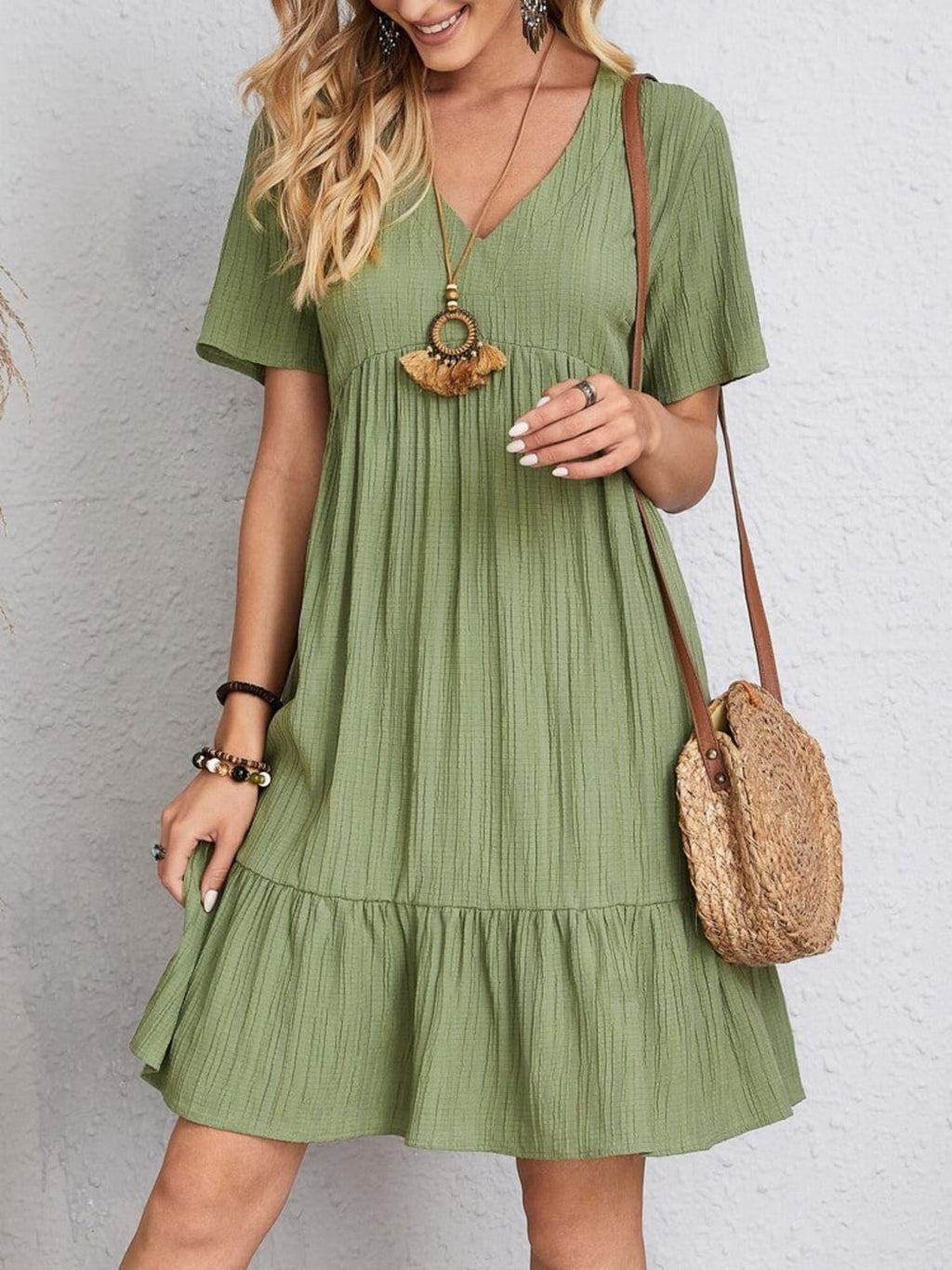 Layered dress with belly coverage, flattering silhouette.