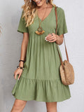Layered dress with belly coverage, flattering silhouette.